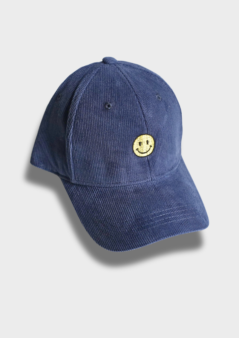 SMILEY Kappe – blaue Bio-Baumwoll-Kappe (Cord), bestickt mit gelben Smiley  - Produktfoto von Ungerade Wien